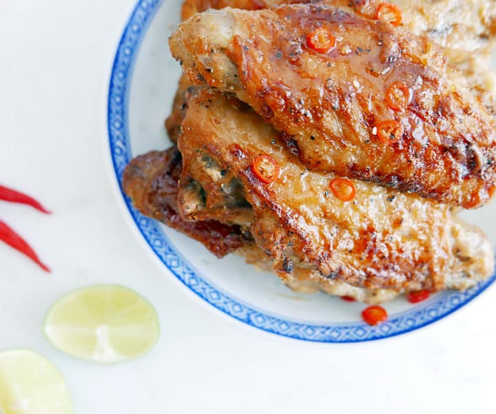 This Vietnamese Spicy Caramel Turkey Wing recipe is easy, big on flavour, yet quick to make! This simple oven turkey wing recipe is rich and tangy. Nomss.com #vietneameserecipe #turkeyrecipes #spicywings #wingrecipe #mealprep #kidsmeals