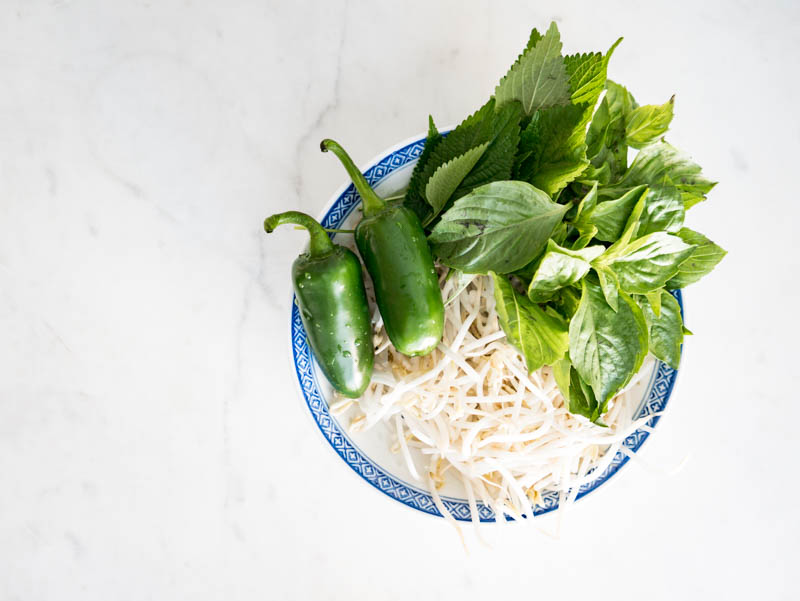 Easy to make Instant Pot Turkey Pho Noodle Recipe. IT’S THE COZIEST TIME OF YEAR AND YOU’RE JUST 30 MINS AWAY FROM A BOWL OF HEALTHY, AROMATIC, AUTHENTIC TURKEY PHO NOODLES! Nomss.com #turkeyrecipes #instantpotrecipes #phonoodles #phorecipes #vietnameserecipes #instanomss