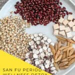 San Fu Period soup ingredients - adzuki beans, Job's tears, Poria mushroom and Mai Dong arranged on wooden table