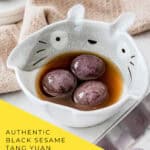 Black sesame tang yuan glutinous rice balls in ceramic bowls with warm ginger broth for Mid-Autumn Festival