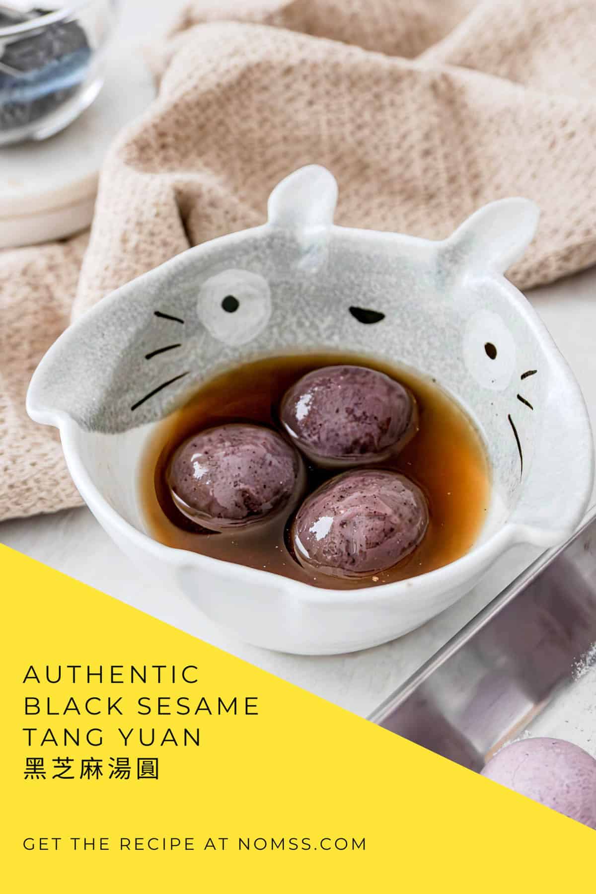 Black sesame tang yuan glutinous rice balls in ceramic bowls with warm ginger broth for Mid-Autumn Festival