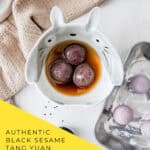 Black sesame tang yuan glutinous rice balls in ceramic bowls with warm ginger broth for Mid-Autumn Festival