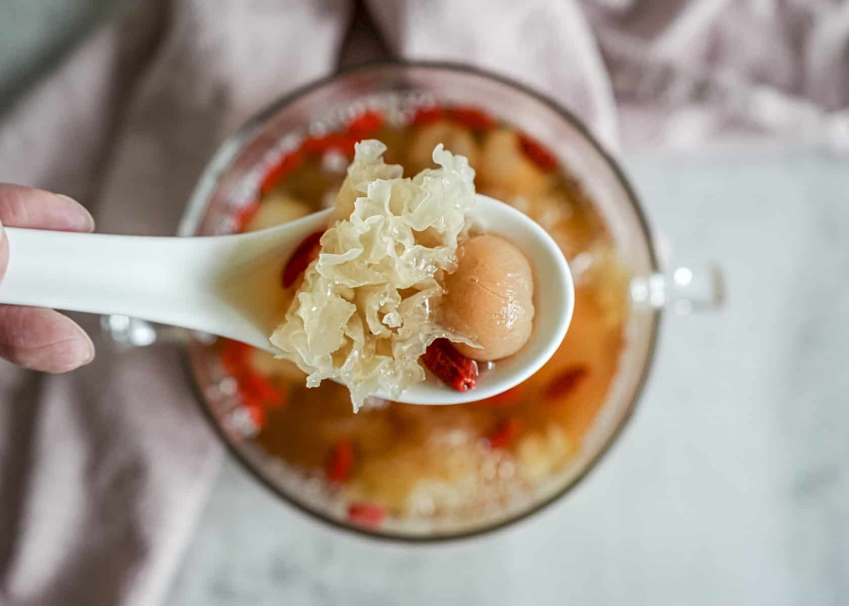 Autumn dryness relief TCM lotus seed lily snow fungus dessert in ceramic bowl for seasonal wellness