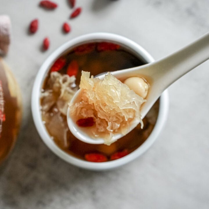 Autumn dryness relief TCM lotus seed lily snow fungus dessert in ceramic bowl for seasonal wellness