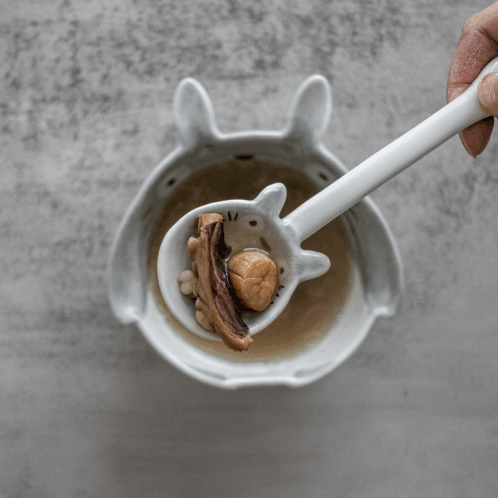 Bowl of traditional Cantonese kidney nourishing soup with chopsticks ready to serve for adrenal fatigue recovery