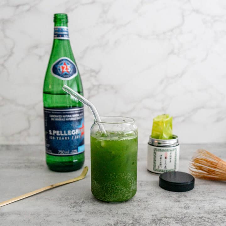 Sparkling matcha recipe with San Pellegrino in glass showing green gradient and bubbles
