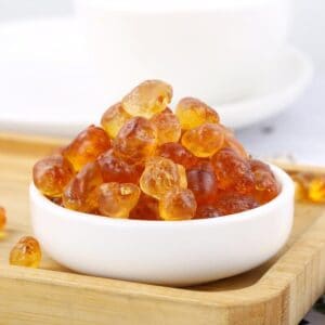 Peach Gum (桃胶, Táo jiāo) Dried peach gum before soaking showing amber colored resin pieces
