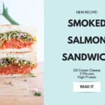 Smoked salmon sandwich with dill cream cheese, capers and fresh alfalfa sprouts on toasted sourdough