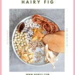 TCM spring dampness soup ingredients including hairy fig Job's tears poria lotus seeds and dried conch on wooden board
