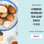 Soft boiled Chinese tea leaf eggs 茶葉蛋 sliced in half showing a marbled brown and white shell pattern and a jammy amber yolk, with text overlay reading soft boiled Chinese tea leaf eggs.