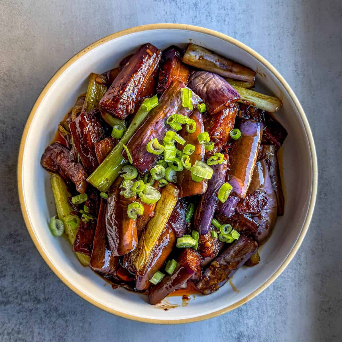 Fish fragrant eggplant recipe with ground pork in a wok