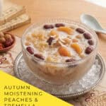 Chilled peach tremella dessert soup in glass bowl with osmanthus garnish for summer serving
